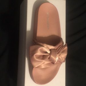 Pink Steve Madden slides